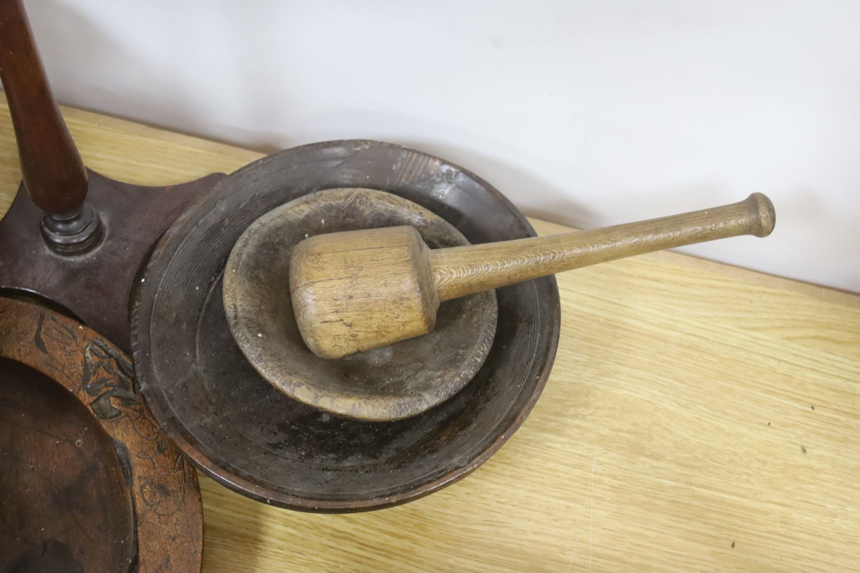 A group of assorted treen including an 18th century sliding lid mahogany box, a candle stand and various goblets etc.